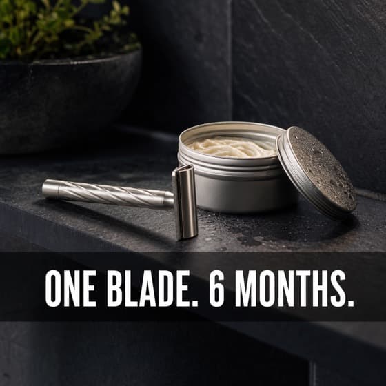 Ad creative: a steel safety razor on a slate shelf.